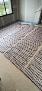 Photo de galerie - Pose d'un plancher chauffant électrique.