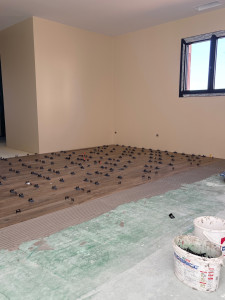 Photo de galerie - Pose carrelage effet bois 