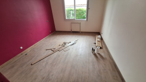 Photo de galerie - Pose revêtement de sol stratifié