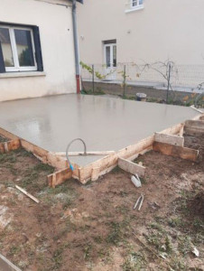 Photo de galerie - Dalle béton .
terrasse arriere maison 