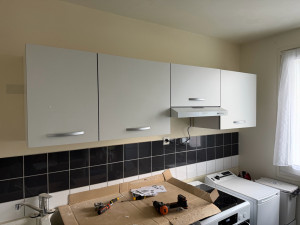 Photo de galerie - Montage et fixation meuble haut avec hotte