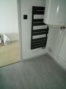 Photo de galerie - Installation de sèche serviette prise et interrupteur 