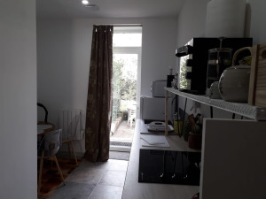 Photo de galerie - Cuisine avec accès jardin