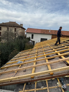 Photo de galerie - Création d'un charpante en bois sur charpante métallique 