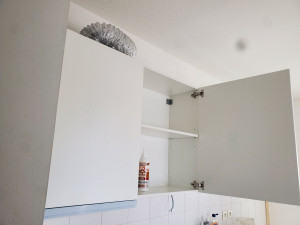 Photo de galerie - Montage de meuble de cuisine avec une hotte