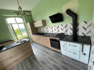Photo de galerie - Pose de parquet et du carrelage dans la cuisine