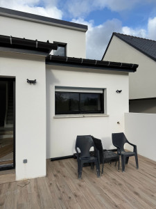 Photo de galerie - Installation de 2 luminaires extérieurs + une prise etanche