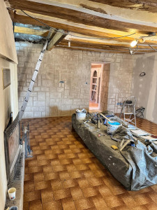 Photo de galerie - Application d'enduit à la chaux en créant une imitation pierre 