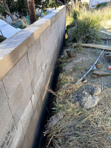 Photo de galerie - Mur en agglo bancher de soutènement 