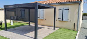 Photo de galerie - Installation montage pergola bi climatique 