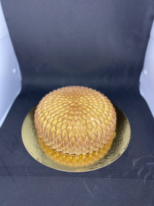 Photo de galerie - Entremet biscuit madeleine, mousse vanille et insert mangue/passion