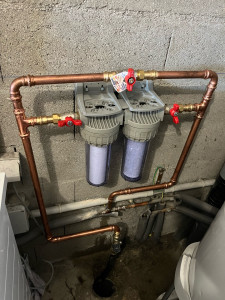 Photo de galerie - Installation cartouche adoucissante