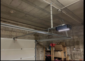 Photo de galerie - Installation porte garage avec motorisation 