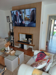Photo de galerie - Pose de tassau et téléviseur 