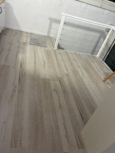 Photo de galerie - Pose parquet véranda 