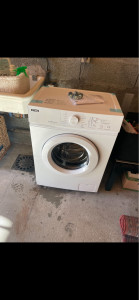 Photo de galerie - Livraison installation complète de la machine à laver