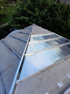 Photo de galerie - Réfection de la toiture en zinc : remplacement des feuille de zinc et pose de couvre-joint