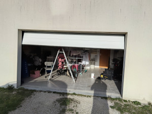 Photo de galerie - Réparation porte sectionnelle changement des ressorts