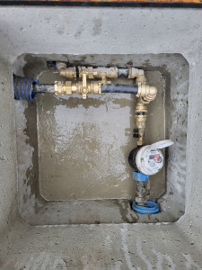 Photo de galerie - Pose d'un regard compteur Aep avec raccordement réseau privé 