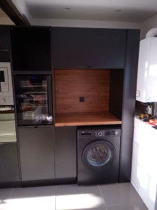 Photo de galerie - Réalisation d'un rallongement de cuisine sur mesure pour Cuisinella 