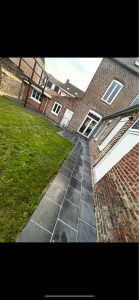 Photo de galerie - Pose de pierre bleue 40x40cm x2cm d’épaisseur 