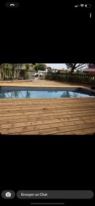 Photo de galerie - Terrassement du sol et pose dun tour de piscine et terrasse en bois exotique 
