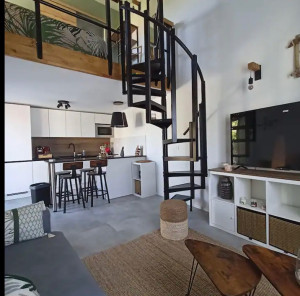 Photo de galerie - Réalisation transformation garage en logement Airbnb