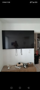 Photo de galerie - Fixation et installation d’un téléviseur au mur