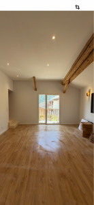 Photo de galerie - Réalisation d’un séjour avec grande hauteur sous plafond 