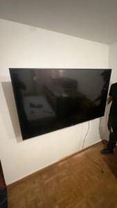 Photo de galerie - Montage de télé avec support mural 