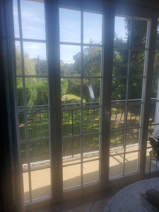 Photo de galerie - Remplacement d'un vitrage cassé avec petit bois PVC incrustés