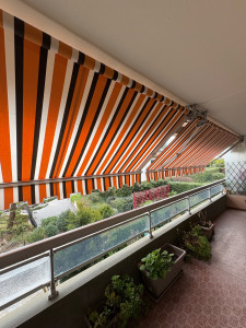 Photo de galerie - Pose de 2 stores toiles motorisés 