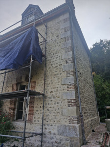 Photo de galerie - Rénovation complète d'un mur en silex / pierre