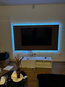 Photo de galerie - Pose mur décoratif tv  et montage de meubles 