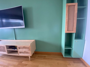 Photo de galerie - Réalisation de deux bibliothèques sur mesure assorties au meuble TV existant (cannage)