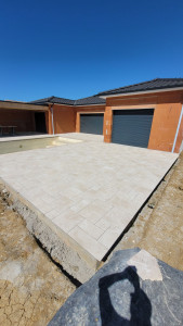 Photo de galerie - Réalisation d'une pose de travertin 140m2