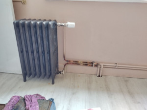 Photo de galerie - Modification d'un radiateur
emplacement choisi par le client 

