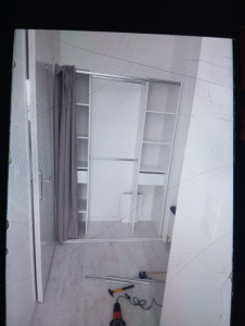 Photo de galerie - Petit dressing à rideaux 