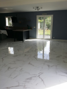 Photo de galerie - Pose de carrelage dans tout le rdc de la maison