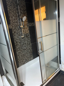 Photo de galerie - Rénovation bac à douche faïence 