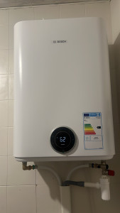 Photo de galerie - Instalation chauffe eau 
toujours par eau service 