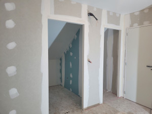 Photo de galerie - Cloison dans une suite parentale 