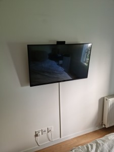 Photo de galerie - Installation télévision au mur