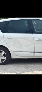 Photo de galerie - Redressage porte arrière droite Renault scéniq