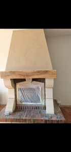 Photo de galerie - Renovation d une cheminée
de la hôte, des pierres ,des poutres bois 