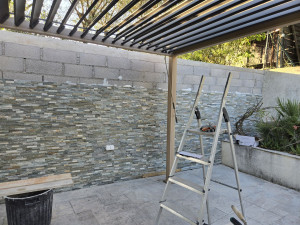 Photo de galerie - Création de mur et pose de pierre décoration 