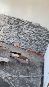 Photo de galerie - Installation de pierre carrelage au mur