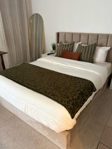 Photo de galerie - Dressing d’un lit