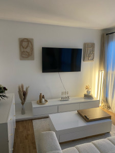 Photo de galerie - Fixez le téléviseur au mur.