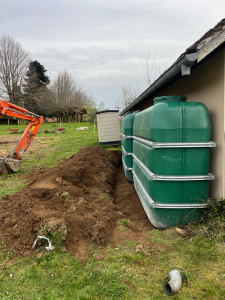 Photo de galerie - Préparation et pose de cuve à eau avec raccordement entre les deux cuve 